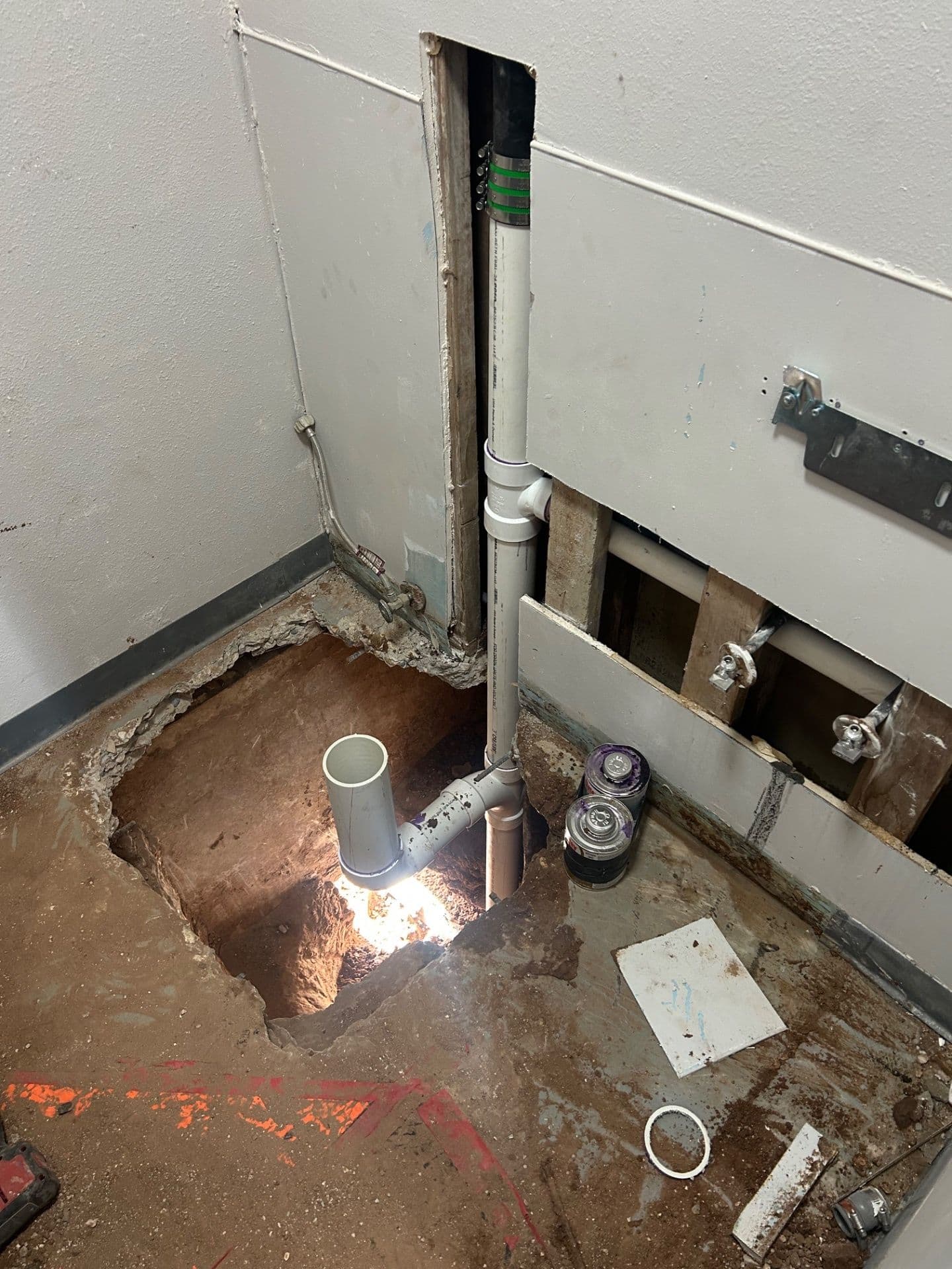 Sewer Line Replacement Under the Slab for Back-to-Back Bathrooms image