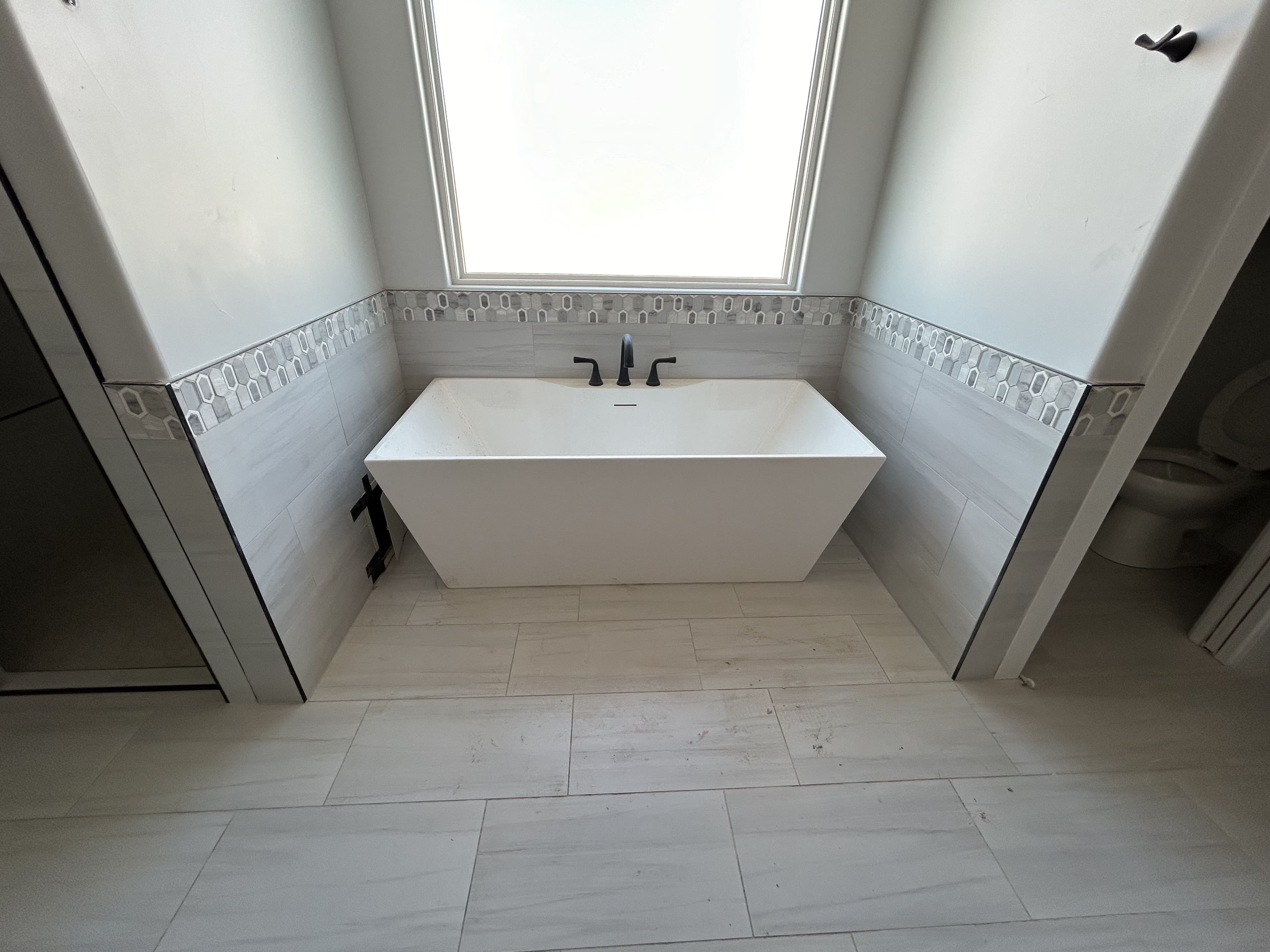 Project Freestanding Tub Installation for a Custom Home Build image